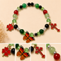 Pulsera Elástica | charms : flor, cruz y mariposa