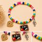 Pulsera Elástica | charms : pizarra, música y corazón