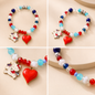 Pulsera Elástica | charms : hello kitty y corazón