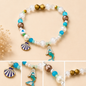 Pulsera Elástica | charms : sirena y concha
