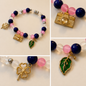 Pulsera Elástica | charms : cámara, hoja y flor