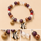 Pulsera Elástica | charms : pez y concha