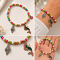 Pulsera Elástica | charms : sirena, caracol y flor