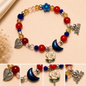 Pulsera Elástica | charms : Luna, corazón, flor y Jesús